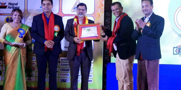 राष्ट्रिय फोटो पत्रकार समूहद्वारा इटहरीका गुरु ढकाल सम्मानित