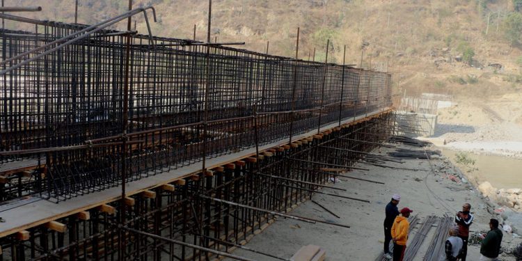 भोजपुर : छ वर्षपछि सुनवालुवा पक्की पुल निर्माण पुनः थालियो