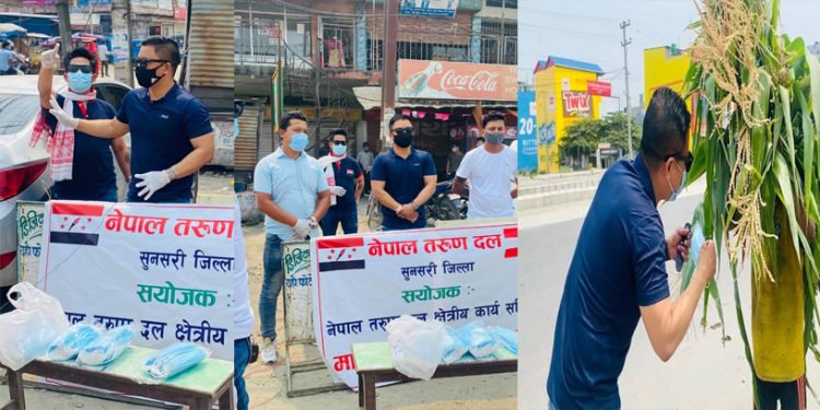 स्वास्थ्य सामाग्री वितरण गर्दै तरुण दल सुनसरी